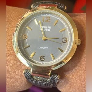 Cruise Club Gold Tone Quartz Watch with a Black Strap and Grey Dial. 10 inches.